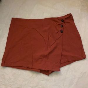 Cute little skirt. Super pretty rust color.